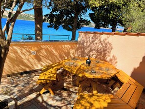 Outdoor dining - Villa Olivija - Dream beachfront apartment for 8 people! (Stara Novalja)