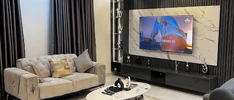 Appartement Deluxe, balcon, vue sur la ville | Aire de séjour