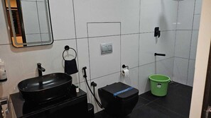 Shower, jetted bath, hair dryer, bidet