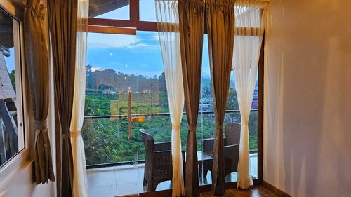 ASR Holidays, Your Cozy Haven in Valparai
