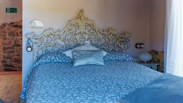 Premium bedding, down comforters, laptop workspace, blackout drapes