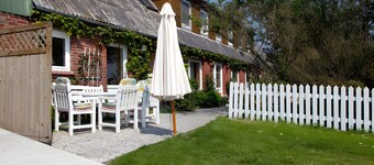 Appartement 'Fewo Mirja' avec terrasse commune, jardin partagé et Wi-Fi