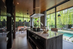 Deluxe Villa, 4 Bedrooms, Private Pool, Park View | Living area | Flat-screen TV - Kelapa Luxury Villa (Sukawati)