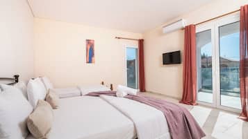 2 chambres, coffres-forts dans les chambres, fer et planche Ă repasser