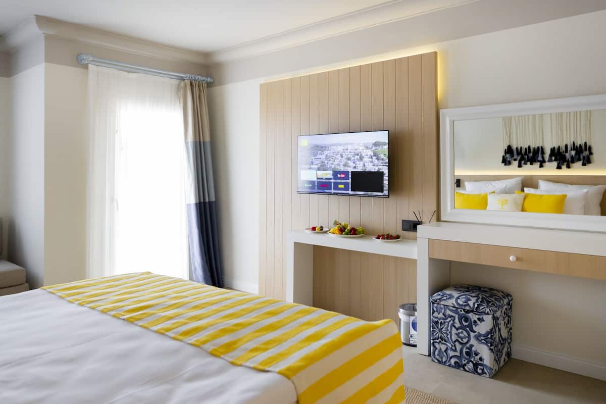 Ropa de cama de alta calidad y minibar