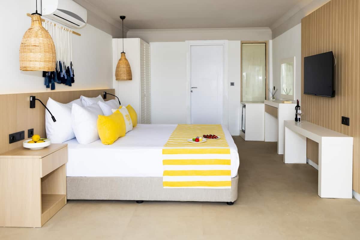 Ropa de cama de alta calidad y minibar