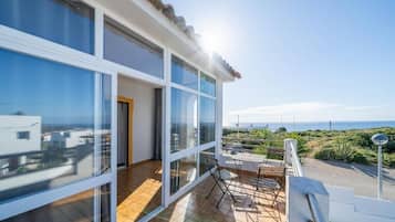 Family Room, Balcony, Ocean View | Property grounds