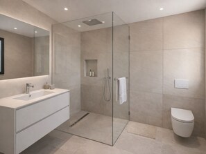 Shower, towels, soap, toilet paper