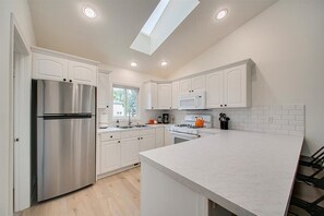 Fridge, microwave, oven, stovetop - Charming Sunset Park Stay Near Parks & Greenbelt (Boise)