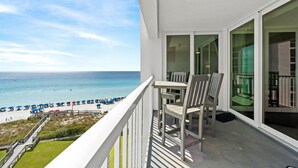 A balcony with a view of the beach and ocean. - Gorgeous ST 2073 w/Beach Service (Destin)