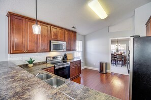 Microwave, dishwasher, coffee/tea maker, cookware/dishes/utensils