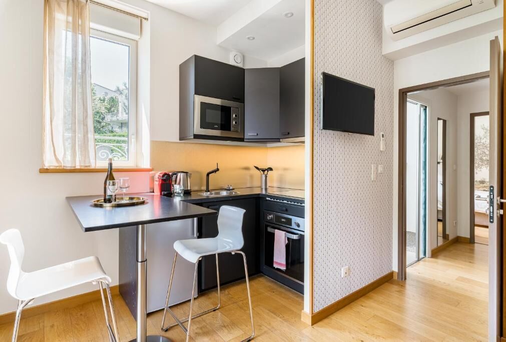 Suite Familiale, balcon | Cuisine privée