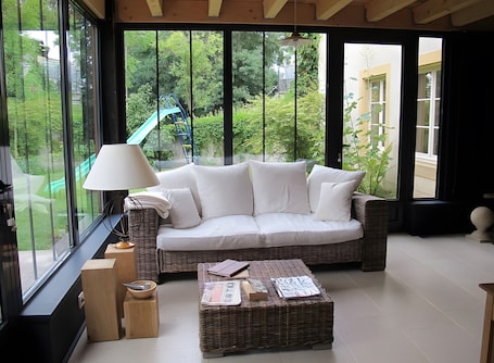 TV. Guest Room "La Chambre du Jardinier" with Shared Terrace, Garden, and Wi-Fi