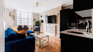 Leilighet – deluxe, eget bad, byutsikt | Lounge