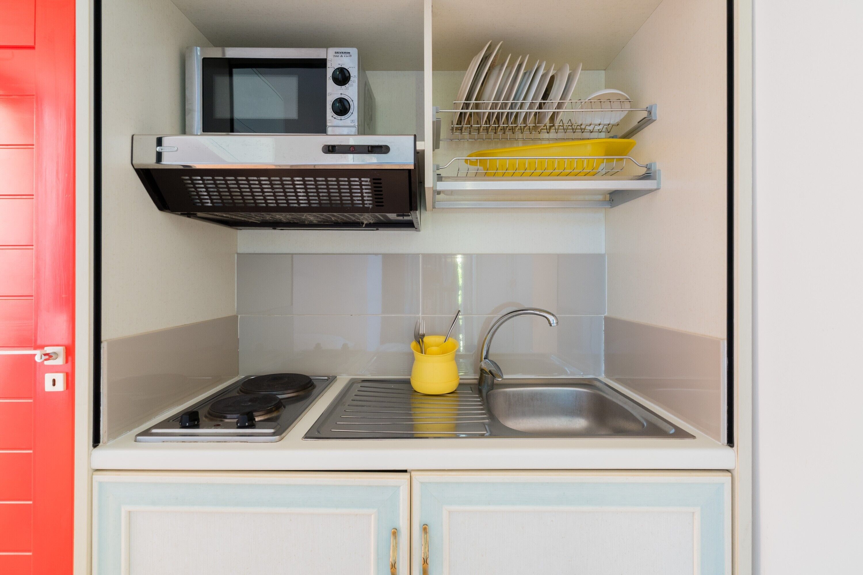 Fridge, microwave, stovetop, cookware/dishes/utensils