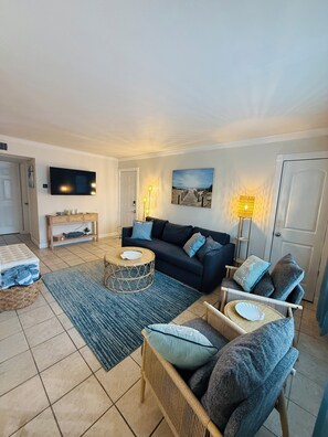Living area - Sandy Toes & Salty Air: 2BR Modern Condo Steps from the Surf (Virginia Beach)