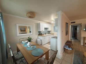 Dining - Sandy Toes & Salty Air: 2BR Modern Condo Steps from the Surf (Virginia Beach)