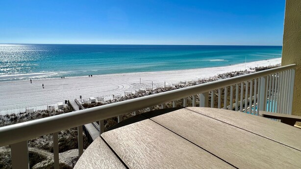 A balcony with a view of a beach and ocean. - Gorgeous “Dolphin Delight” 616, Penthouse, Free Activities Included! (Fort Walton Beach)