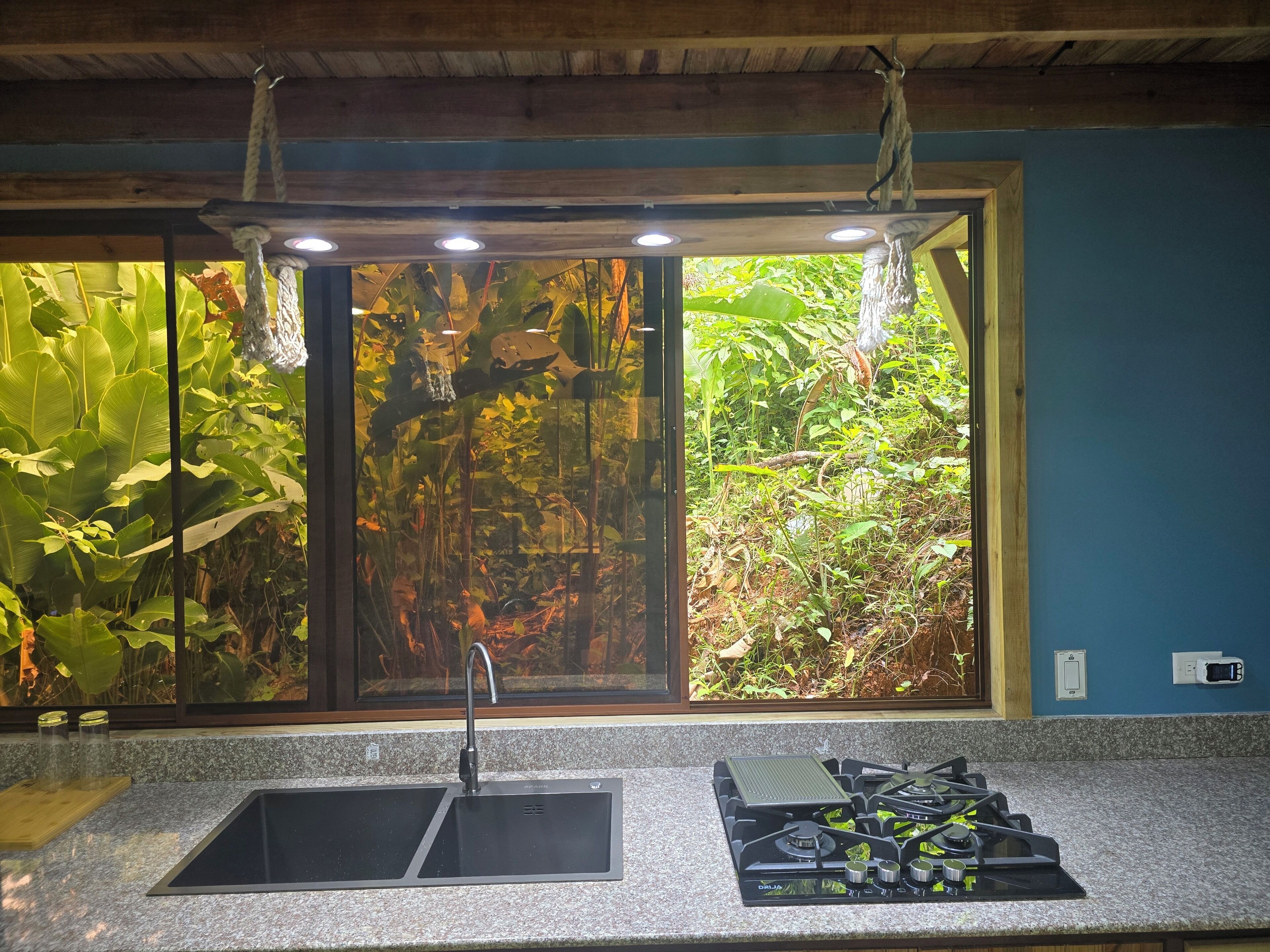 Fridge, microwave, coffee/tea maker, cookware/dishes/utensils