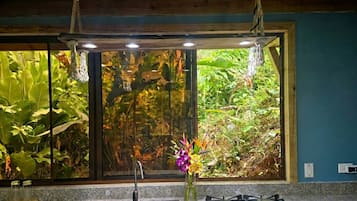 Fridge, microwave, coffee/tea maker, cookware/dishes/utensils