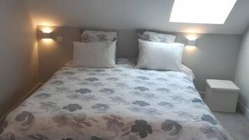 Family Room, Private Bathroom | Individually furnished, desk, laptop workspace, blackout drapes