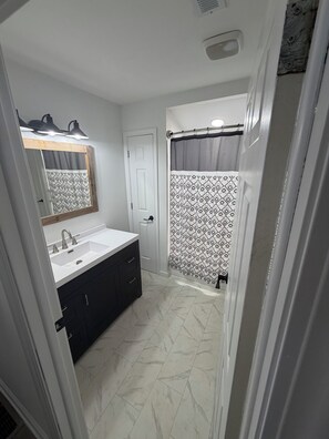 Shower, towels, toilet paper