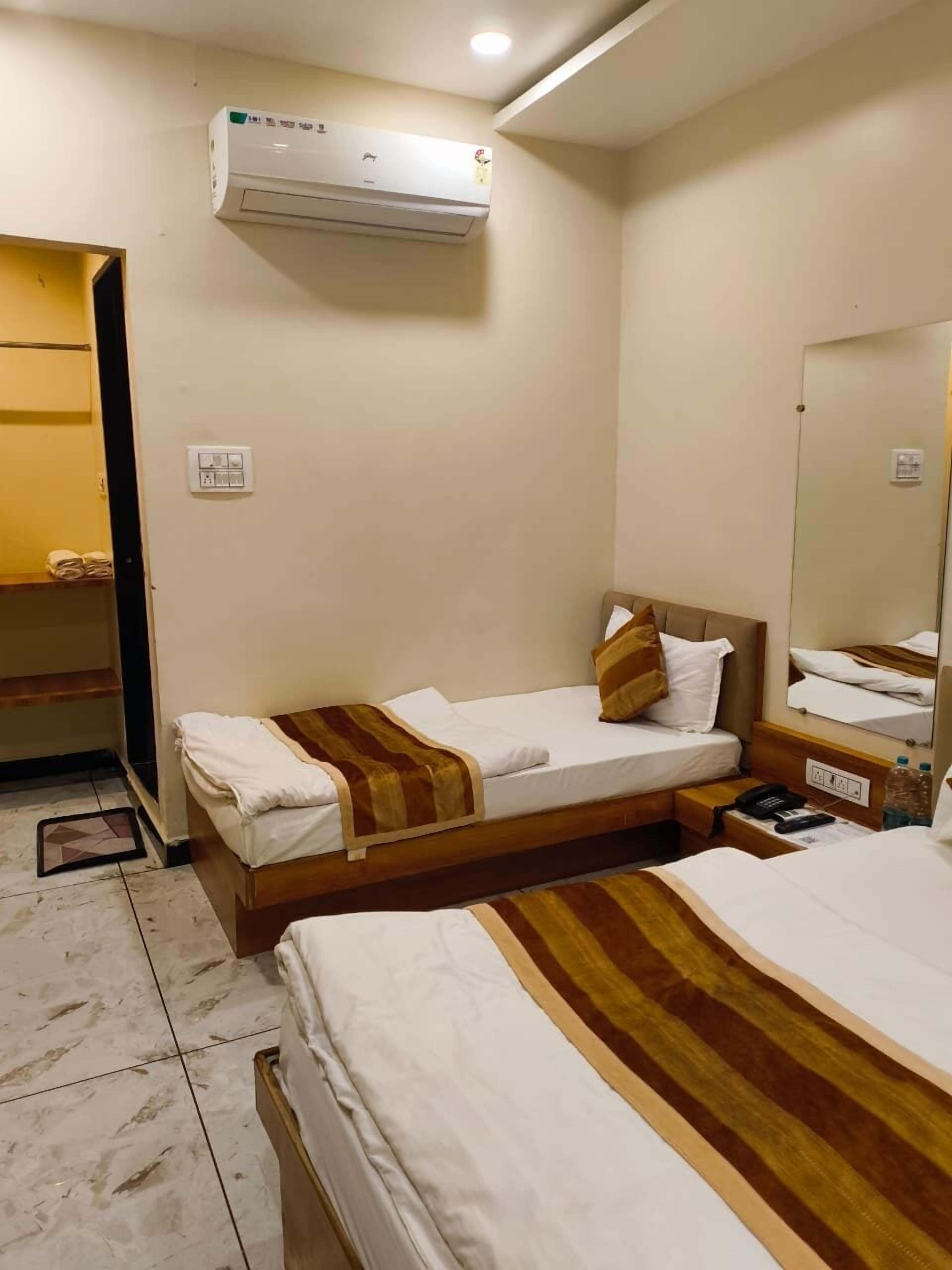 Quarto triplo superior | Wi-Fi de cortesia, roupa de cama