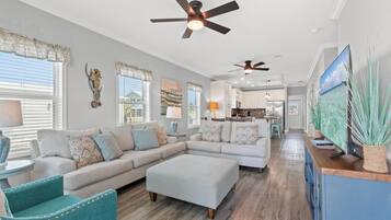 House | Living area | 65-inch Smart TV with digital channels, Netflix, Hulu