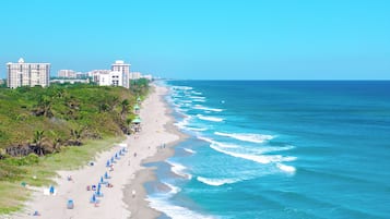 On the beach, sun loungers, beach towels