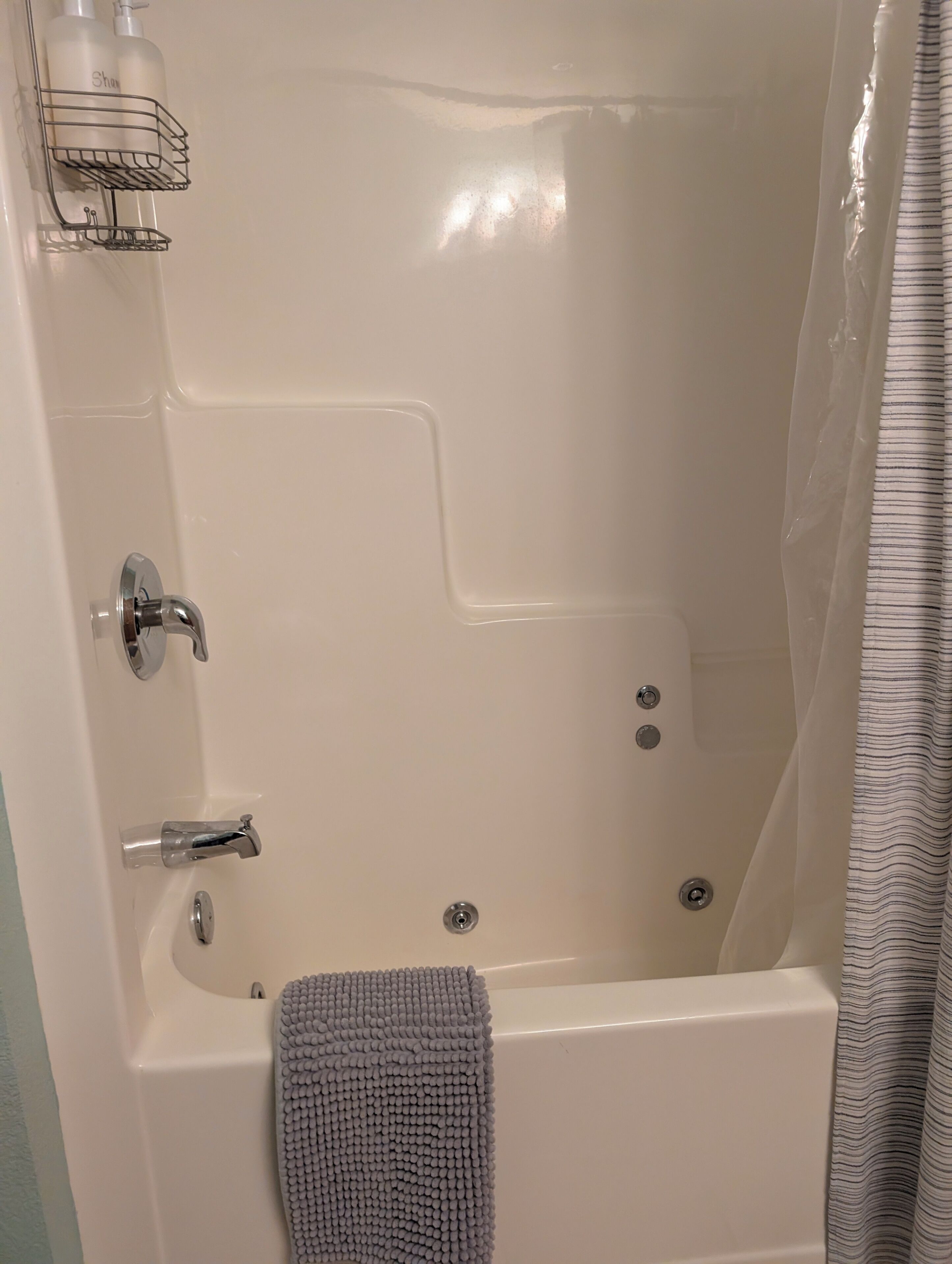 Shower, jetted tub, hair dryer, towels