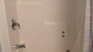 Shower, jetted tub, hair dryer, towels