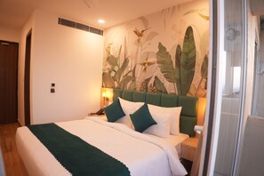 Deluxe Double Room, City View | Minibar, desk, laptop workspace, iron/ironing board - Hibiscus Elite Hotel (Greater Noida)