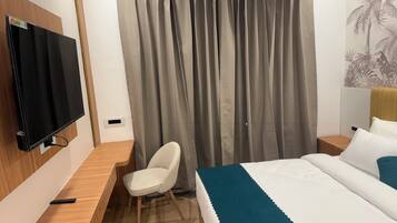 Deluxe Double or Twin Room, City View | Desk, laptop workspace, iron/ironing board, free WiFi