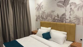 Deluxe Double or Twin Room, City View | Desk, laptop workspace, iron/ironing board, free WiFi