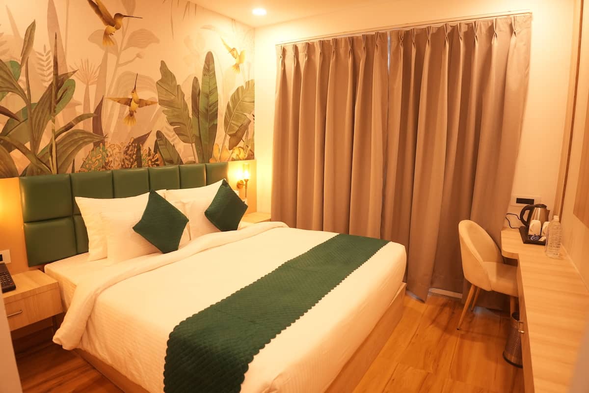 Deluxe Double Room, City View | Desk, laptop workspace, iron/ironing board, free WiFi