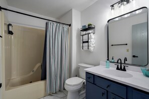 Hair dryer, towels, soap, toilet paper