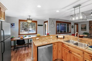 Fridge, microwave, oven, stovetop - Escape to the Mountains | Hot Tub | Fire Pit | Game Room w/ Pool Table | Kids Toys | 5 min to Lake! (Donnelly)