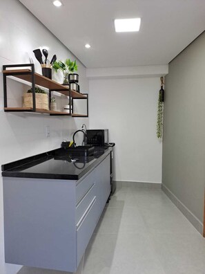 Private kitchen - Loft 1 Comfort and Convenience in the Center of Indaiatuba (Jardim America Indaiatuba)