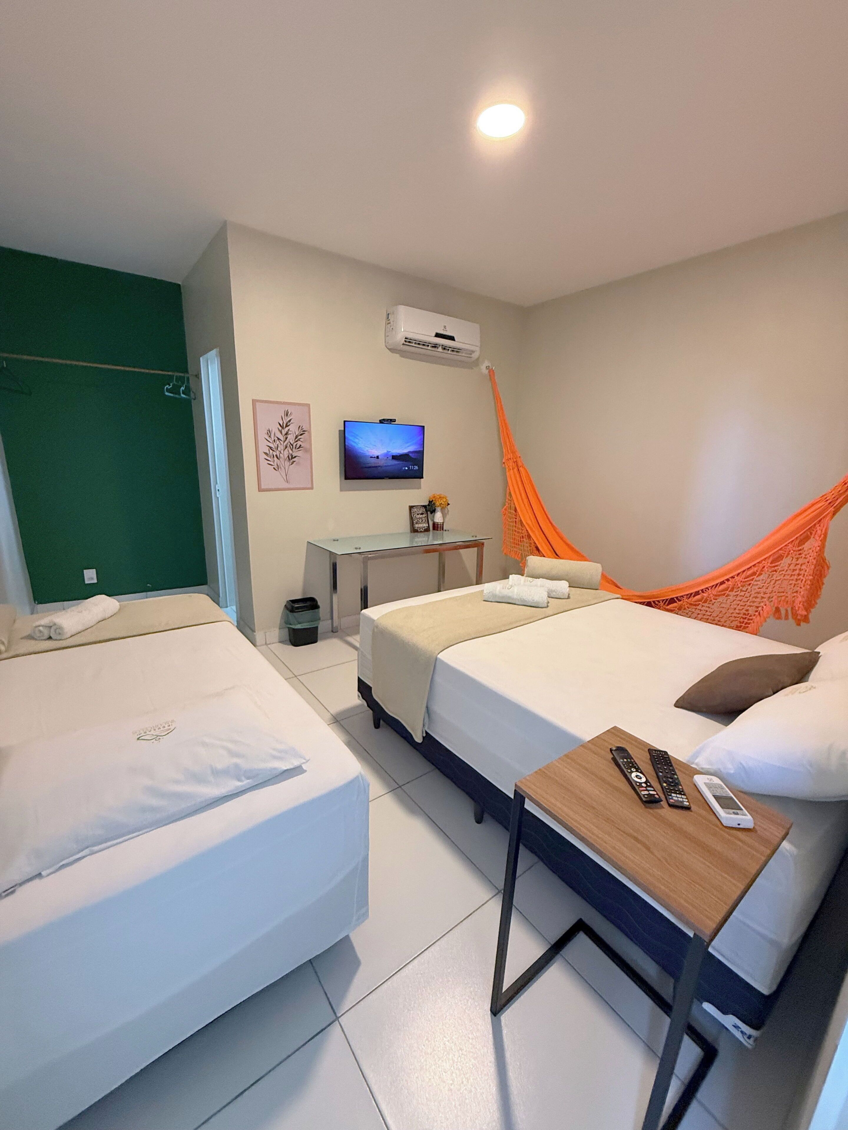 Quarto triplo premium, 1 quarto, para não fumantes, ar-condicionado | Wi-Fi de cortesia