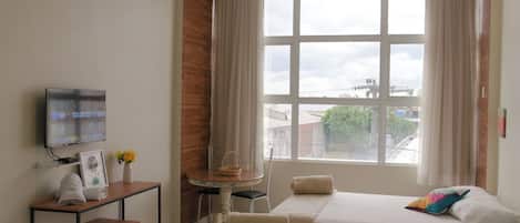 Habitación cuádruple Deluxe, 1 habitación, aire acondicionado | Wifi gratis