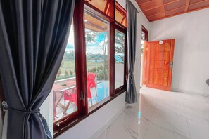 Deluxe Room | Interior - Doni Guest House by Staigo (Samosir)