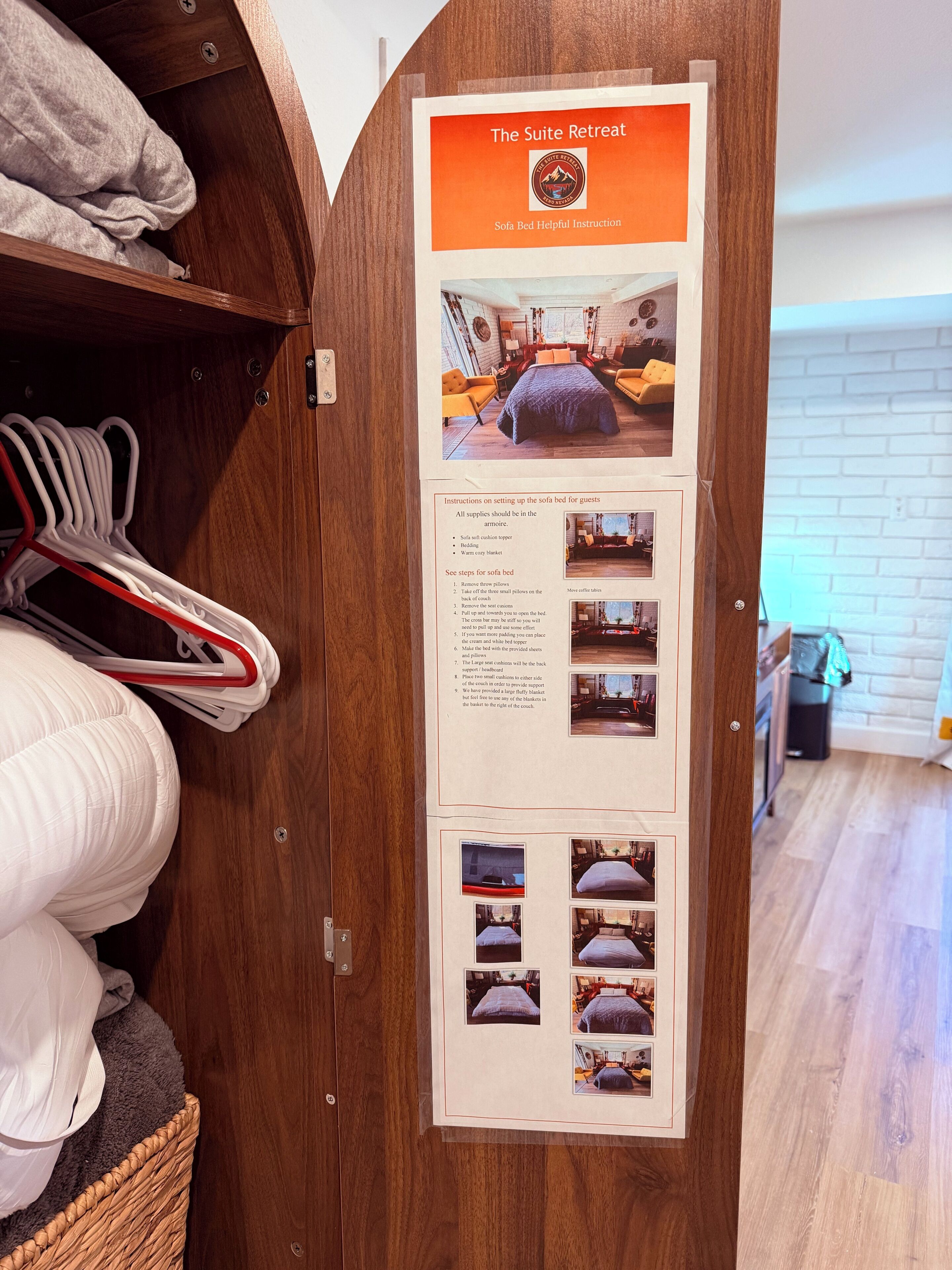 A wooden door with a sign detailing sofa bed setup instructions, including a photo of a room with a sofa bed.