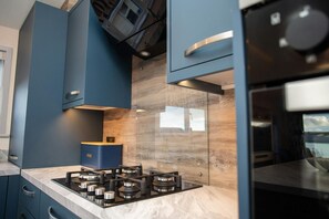 Fridge, microwave, coffee/tea maker, toaster