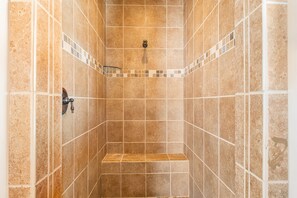 Shower, jetted tub, towels