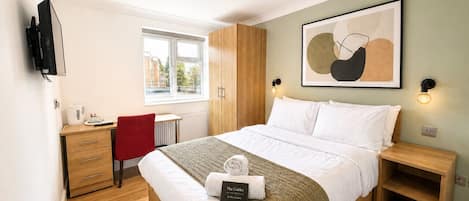 Iron/ironing board, travel crib, WiFi, bed sheets