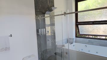 Junior Suite, Mountain View | Bathroom | Separate tub and shower, towels, soap, shampoo