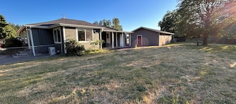 Quiet country neighborhood house is on 2.5 acre lot,includes water, sewer, power