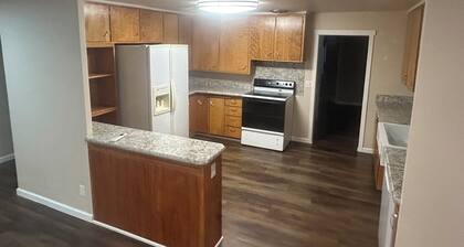 Quiet country neighborhood house is on 2.5 acre lot,includes water, sewer, power