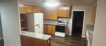 Quiet country neighborhood house is on 2.5 acre lot,includes water, sewer, power