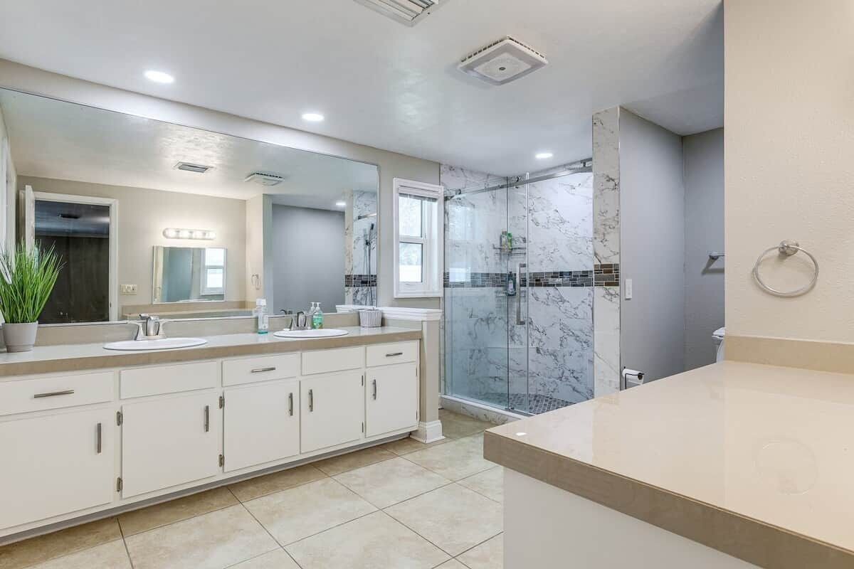 Shower, hair dryer, towels, toilet paper